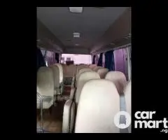 Toyota Coaster Bus for rental services